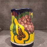 Ceramic pitcher with fruit and vine decoration - colorful rustic style