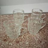 Set of four glass mugs