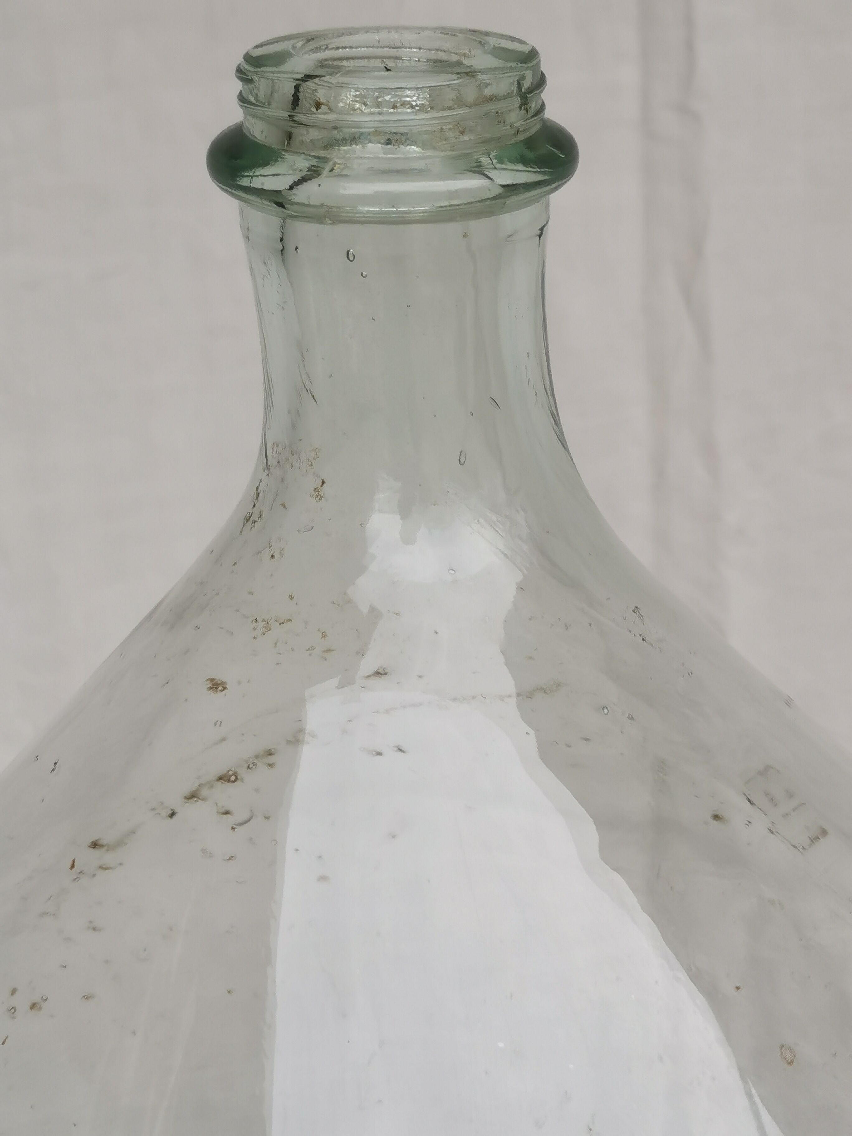 Large old lady Jeanne in transparent glass