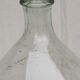 Large old lady Jeanne in transparent glass