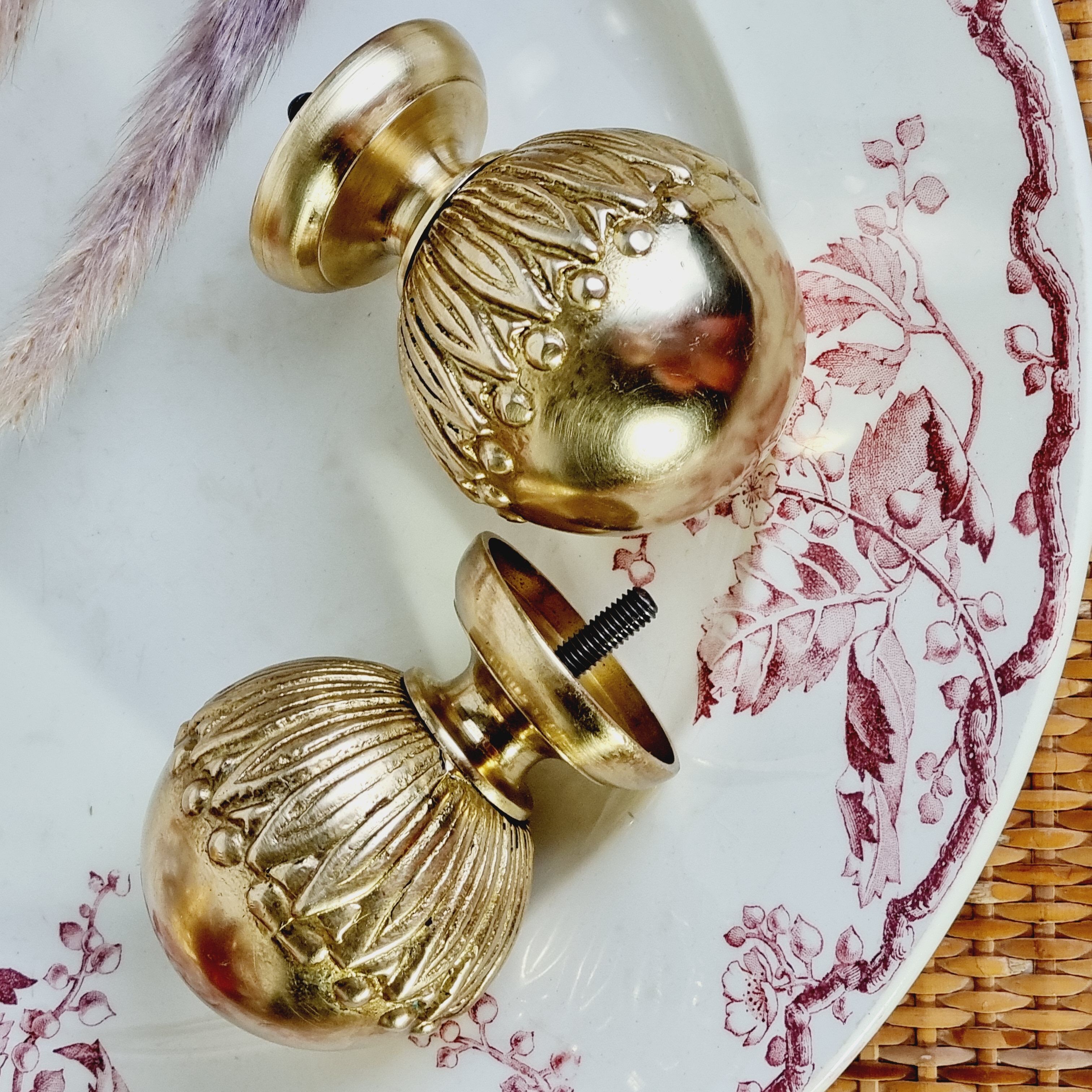2 gilded brass door handles