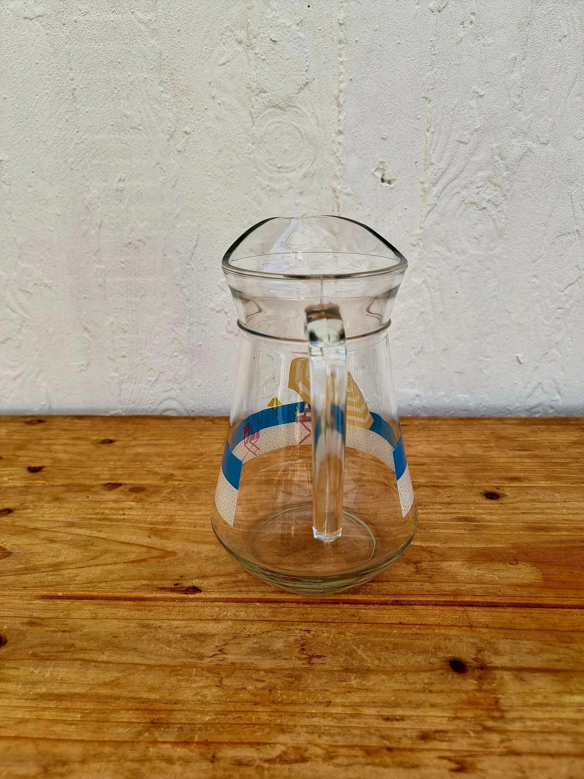 Jug with a summer design in vintage glass