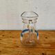 Jug with a summer design in vintage glass