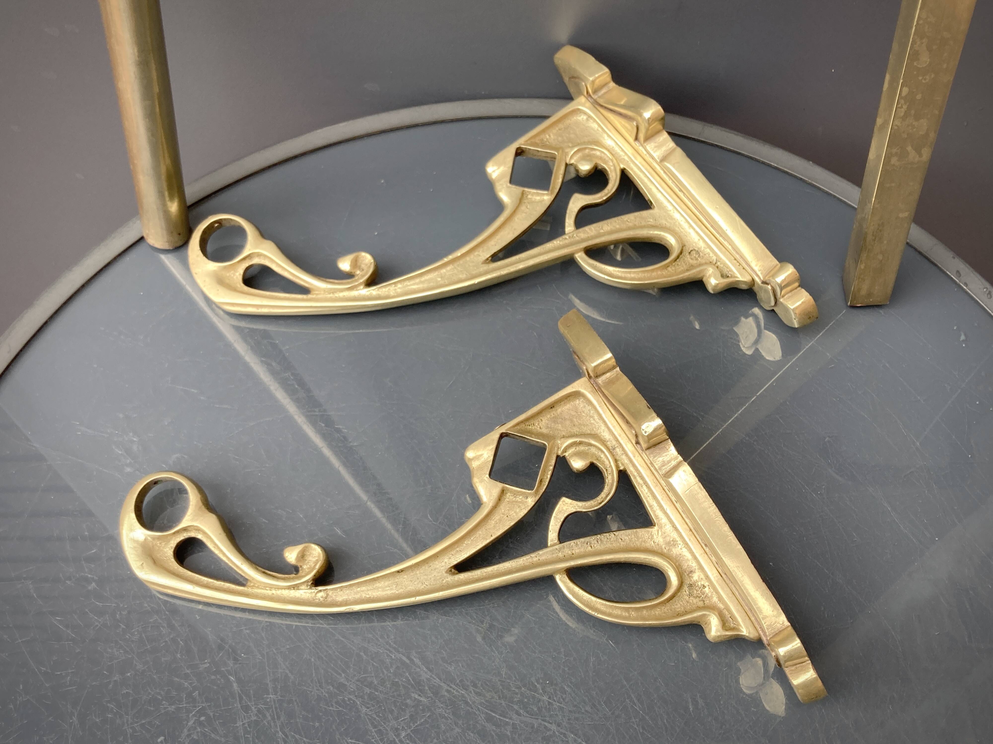 Art-deco wall-mounted coat rack in brass