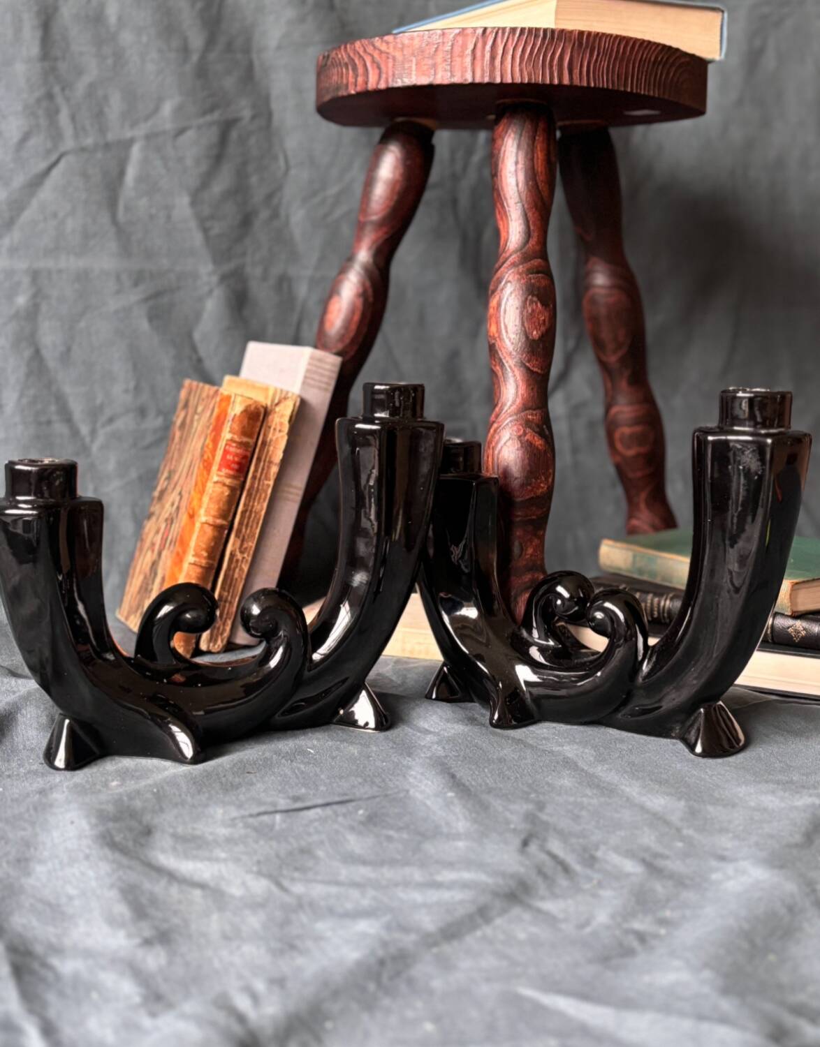 2 black ceramic candle holders