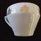 Set of six Art Deco white fine porcelain coffee cups and saucers