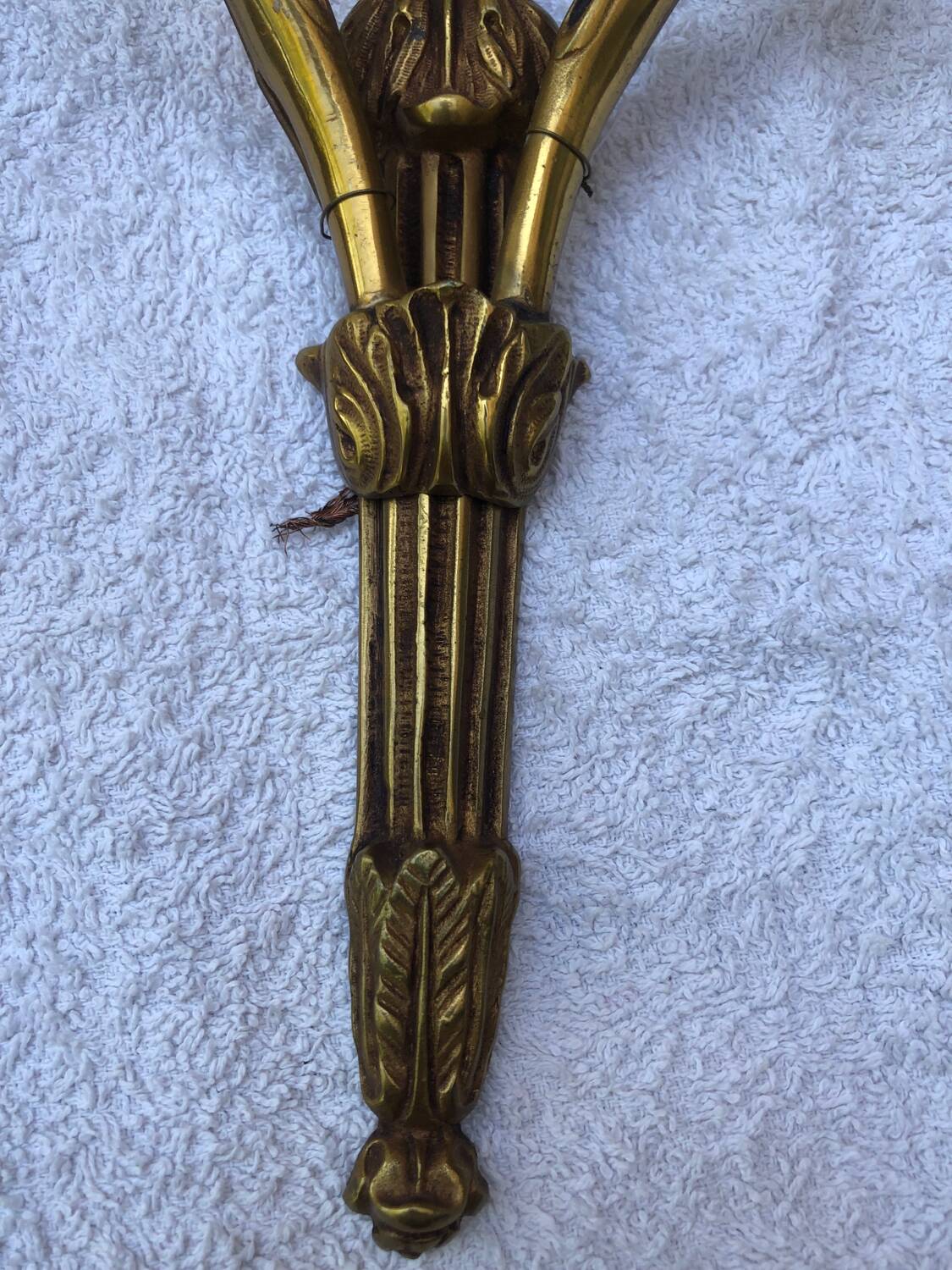 Pair of Louis XVI style bronze wall lights