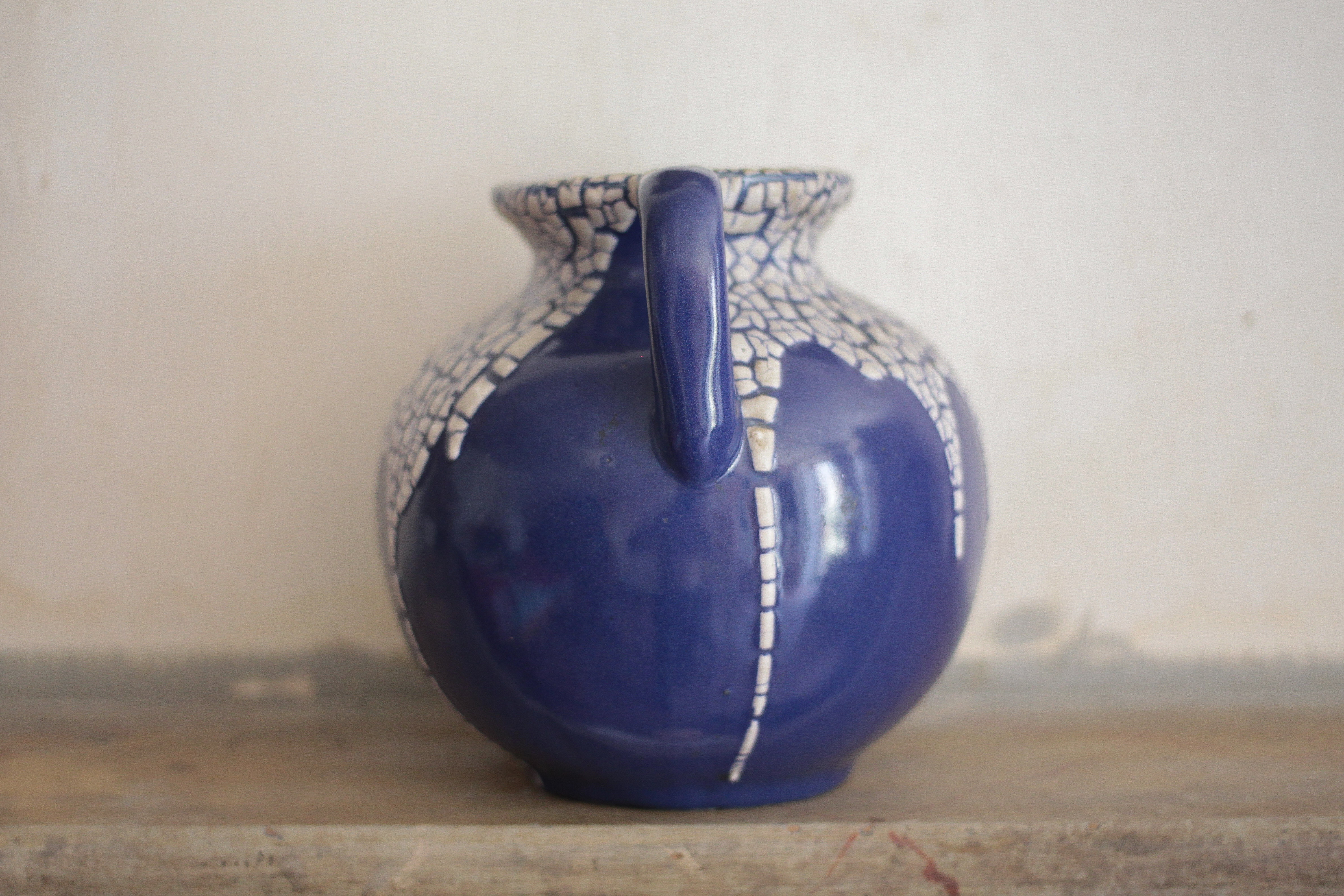 Vase signed Léon Pointu, ceramic vase with a glazed snake skin effect.