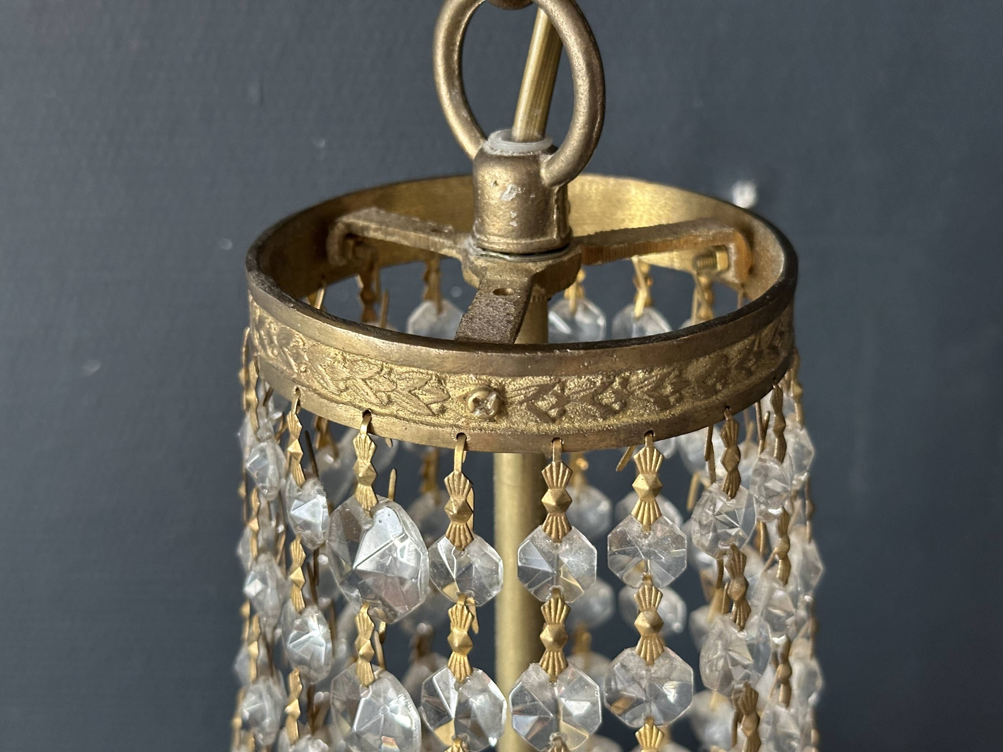 Golden bronze hot air balloon chandelier with glass pendants, mid-20th century.
