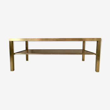 Table 2 floors in gold metal and sunglasses