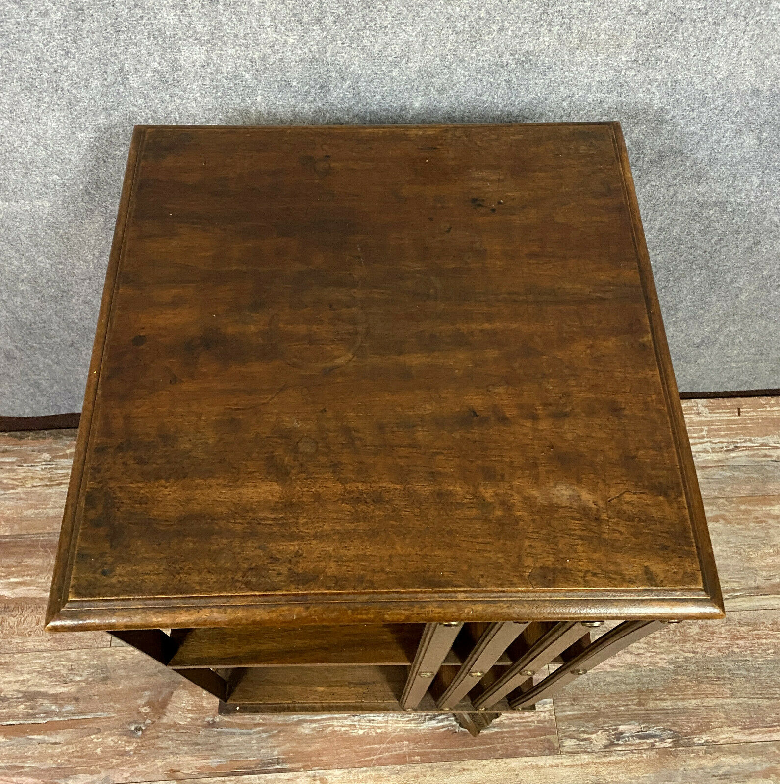 Revolving library with mahogany bars circa 1900