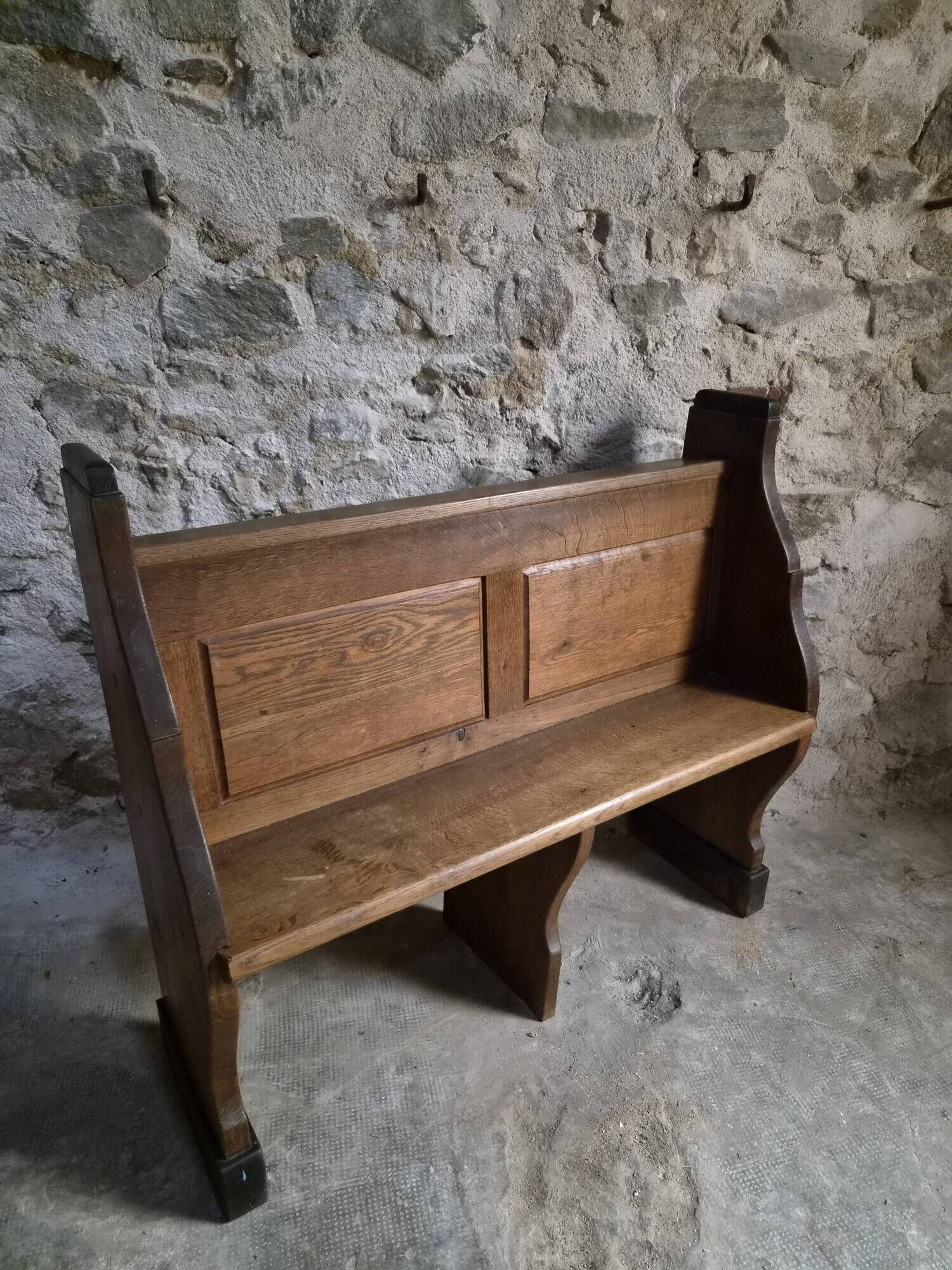 Antique church bench in oak, circa 1900–1920