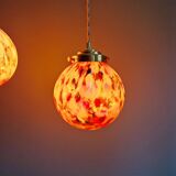 Duo de suspensions Art Déco en verre moucheté multicolore, 1930