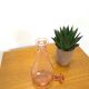 Carafe en verre rose vintage