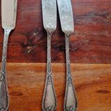 Christofle, Paris - Set of 12 fish knives - crossed ribbons model