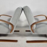 Armchairs in Walnut by Miroslav Navratil for Up Zavody, 1940s