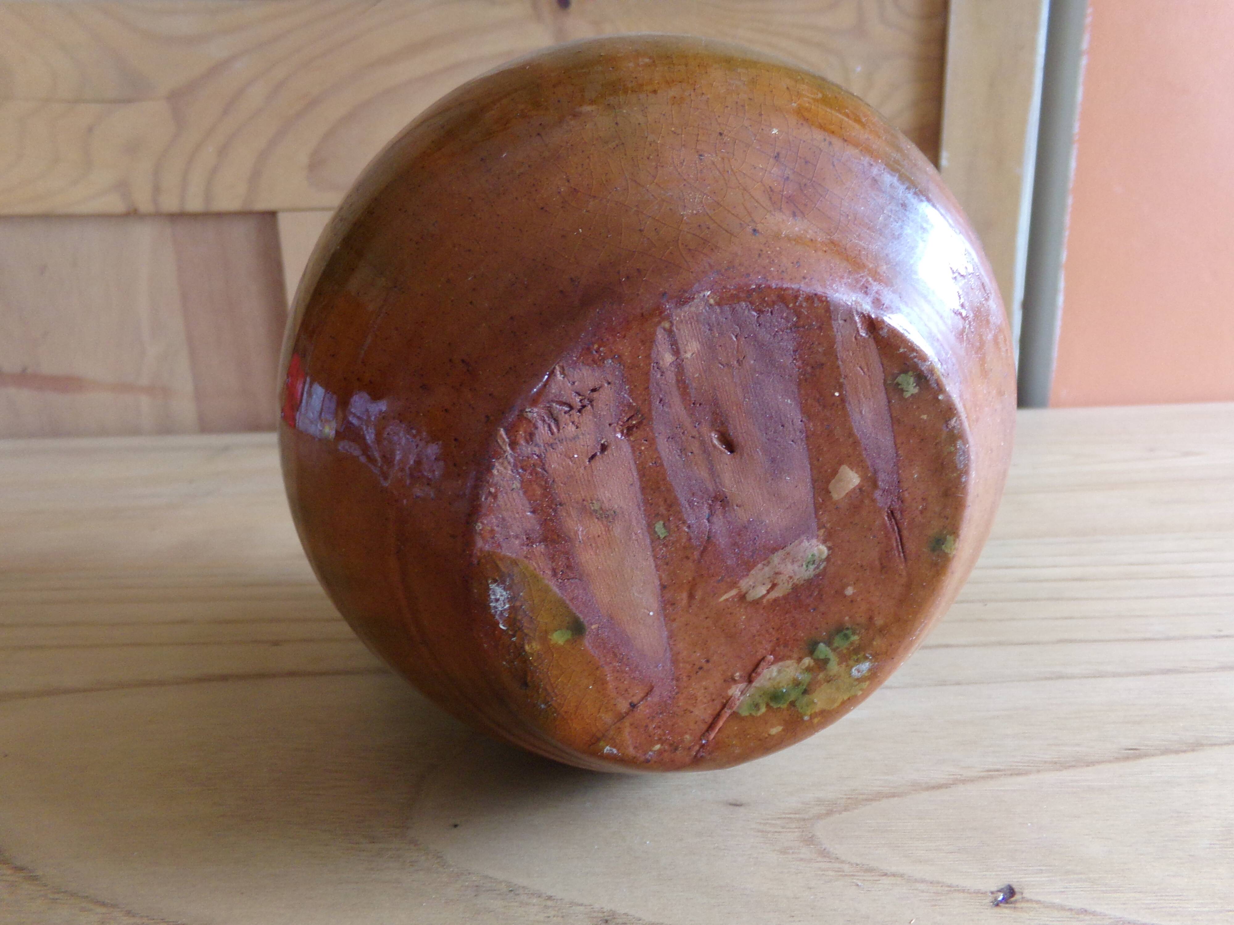 Enamelled terracotta jug