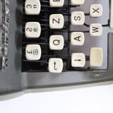 Remington travel-deter Deluxe typewriter with  case