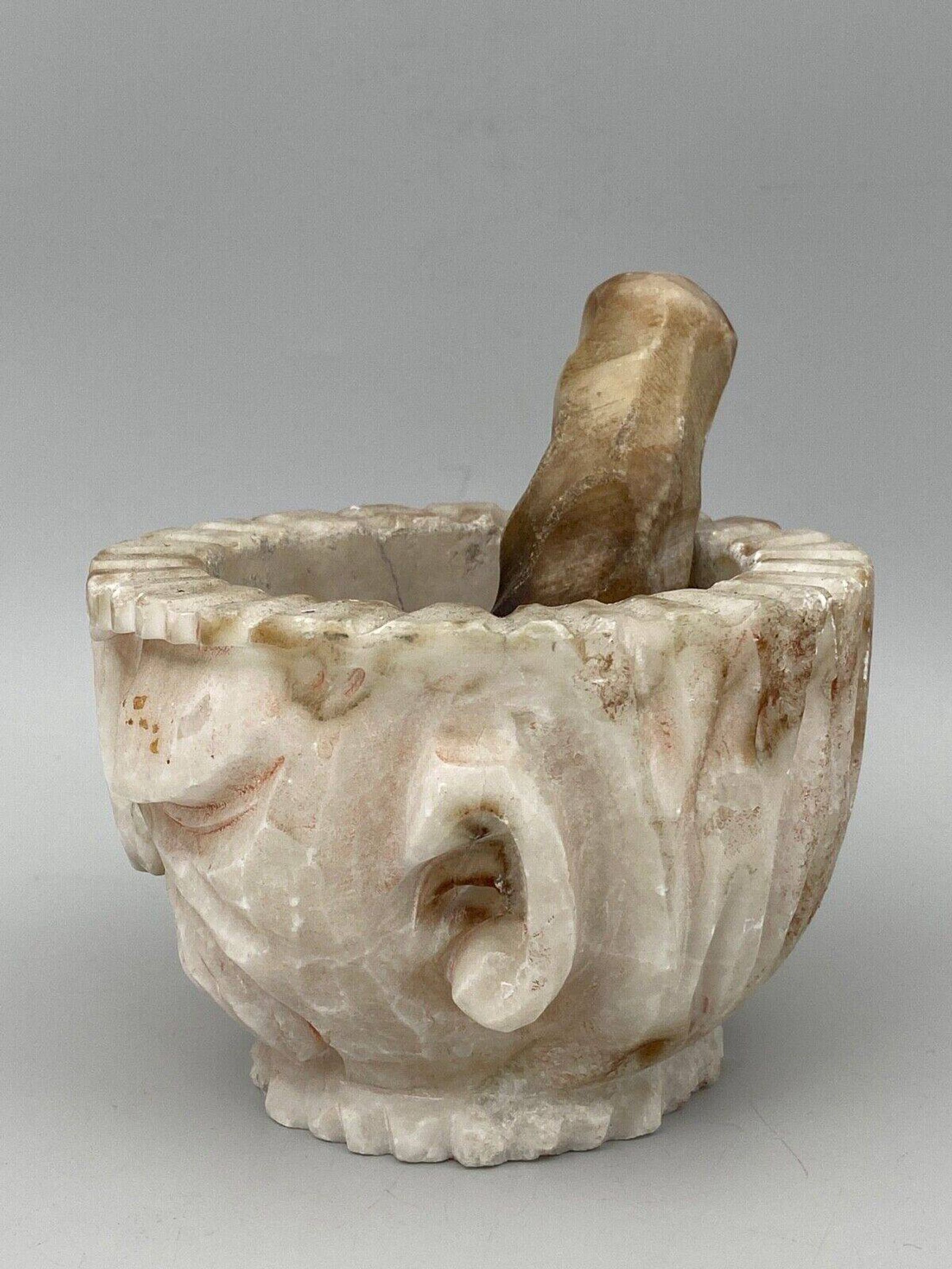 Pharmacy mortar and pestle in alabaster China man's face