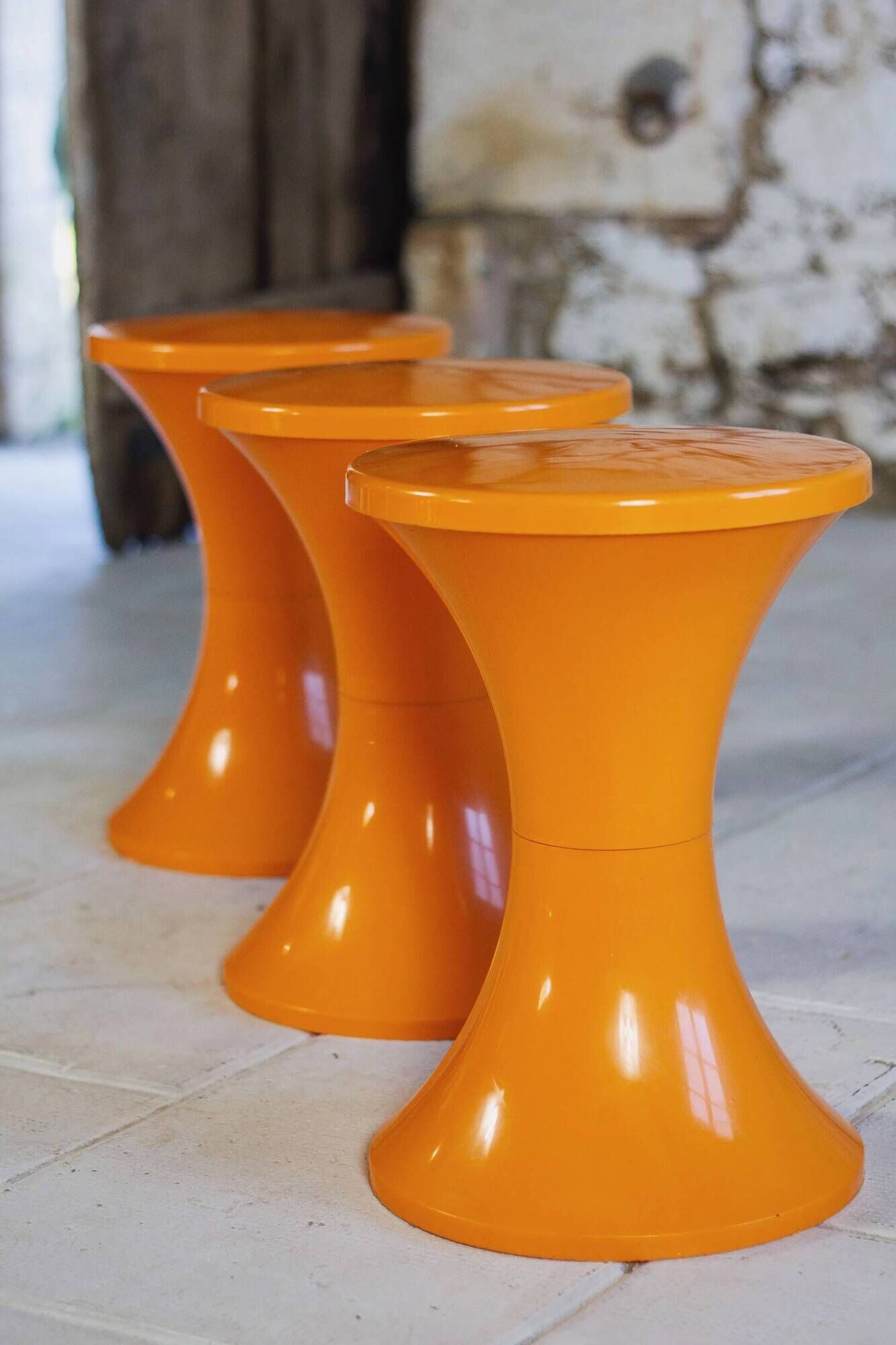 Set of 3 Tam Tam stools in orange by Henri Massonnet for Stamp, 1970.