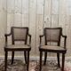 Paire de fauteuils cannés de style Louis XVI