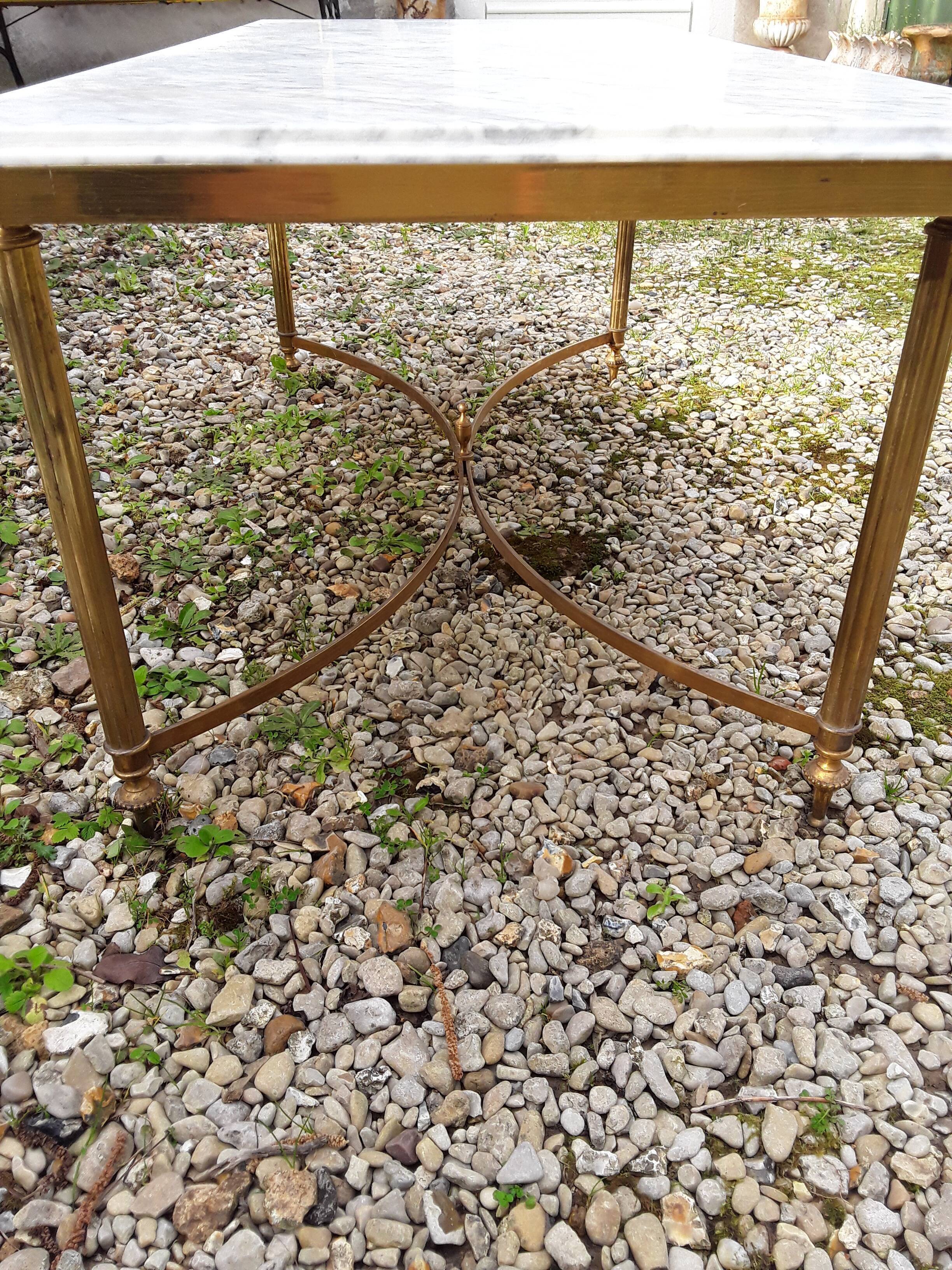 Marble coffee table and gilded brass