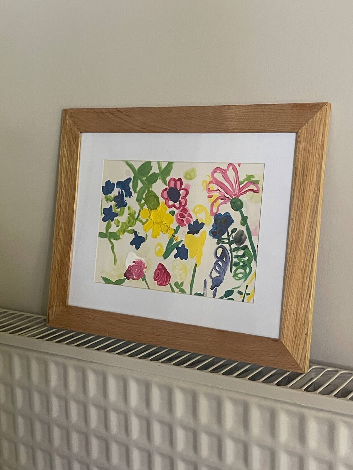 Flower painting in an antique frame