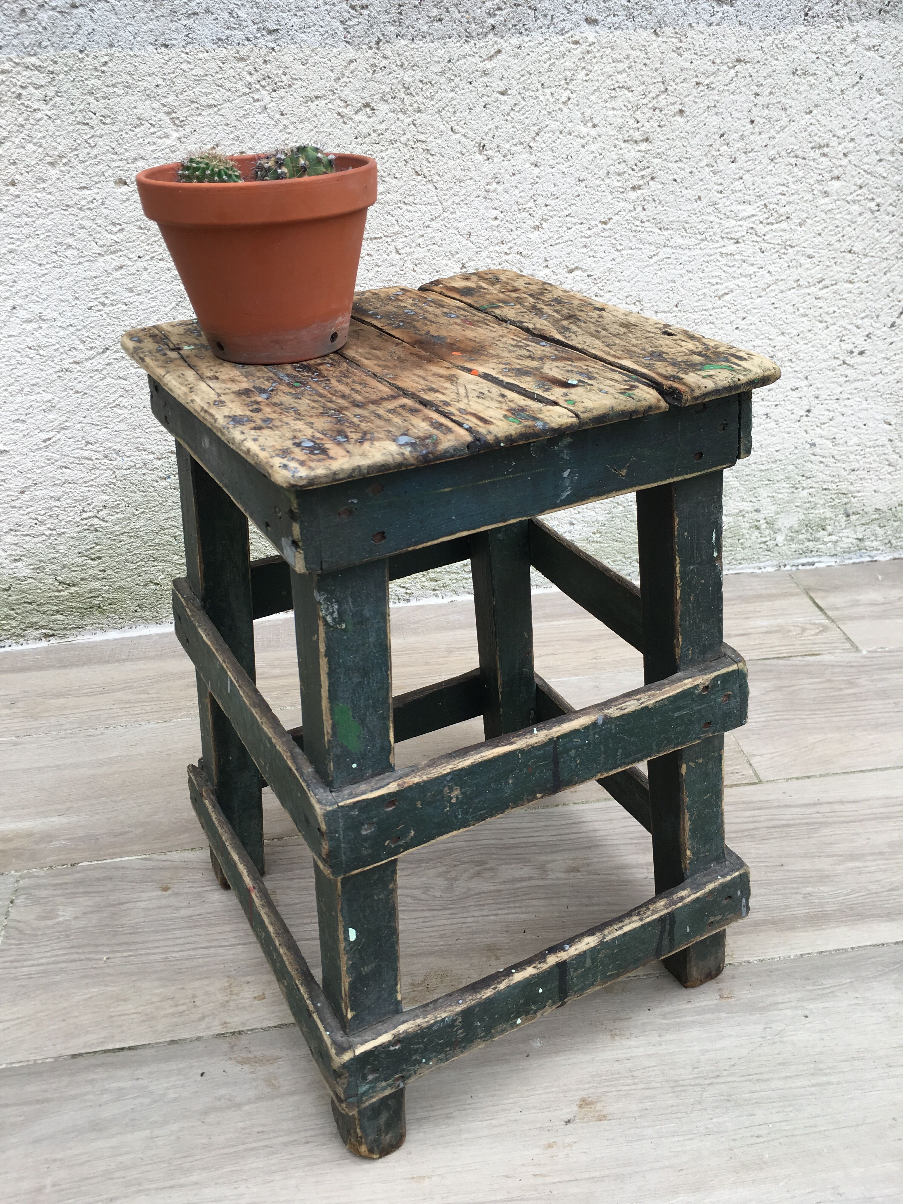 Former green workshop stool