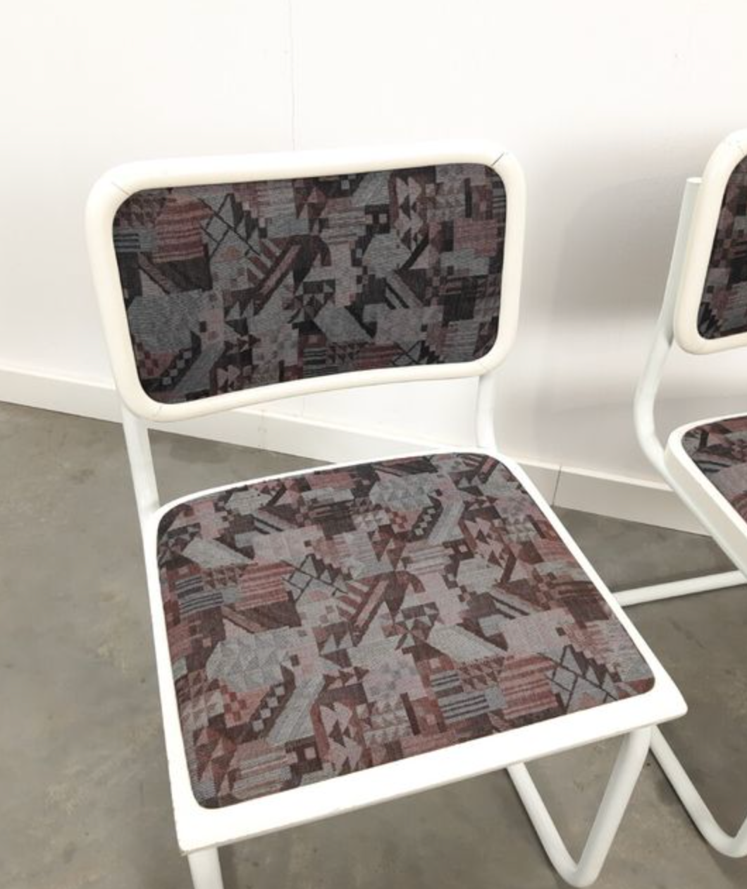 Pair of vintage tubular frame dining chairs