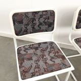 Pair of vintage tubular frame dining chairs