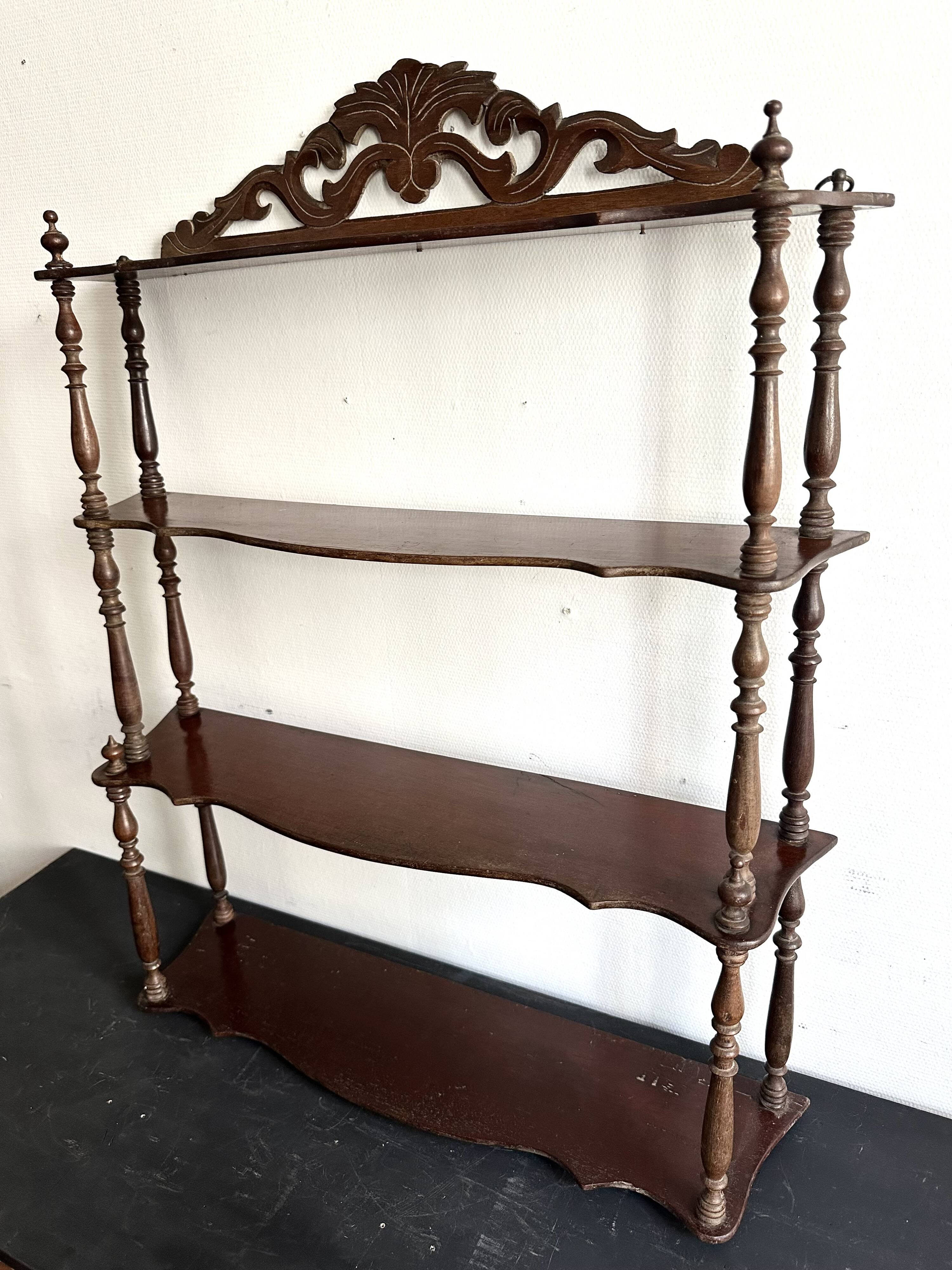 Large Napoleon III shelf in turned wood with a pediment.