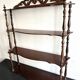 Large Napoleon III shelf in turned wood with a pediment.
