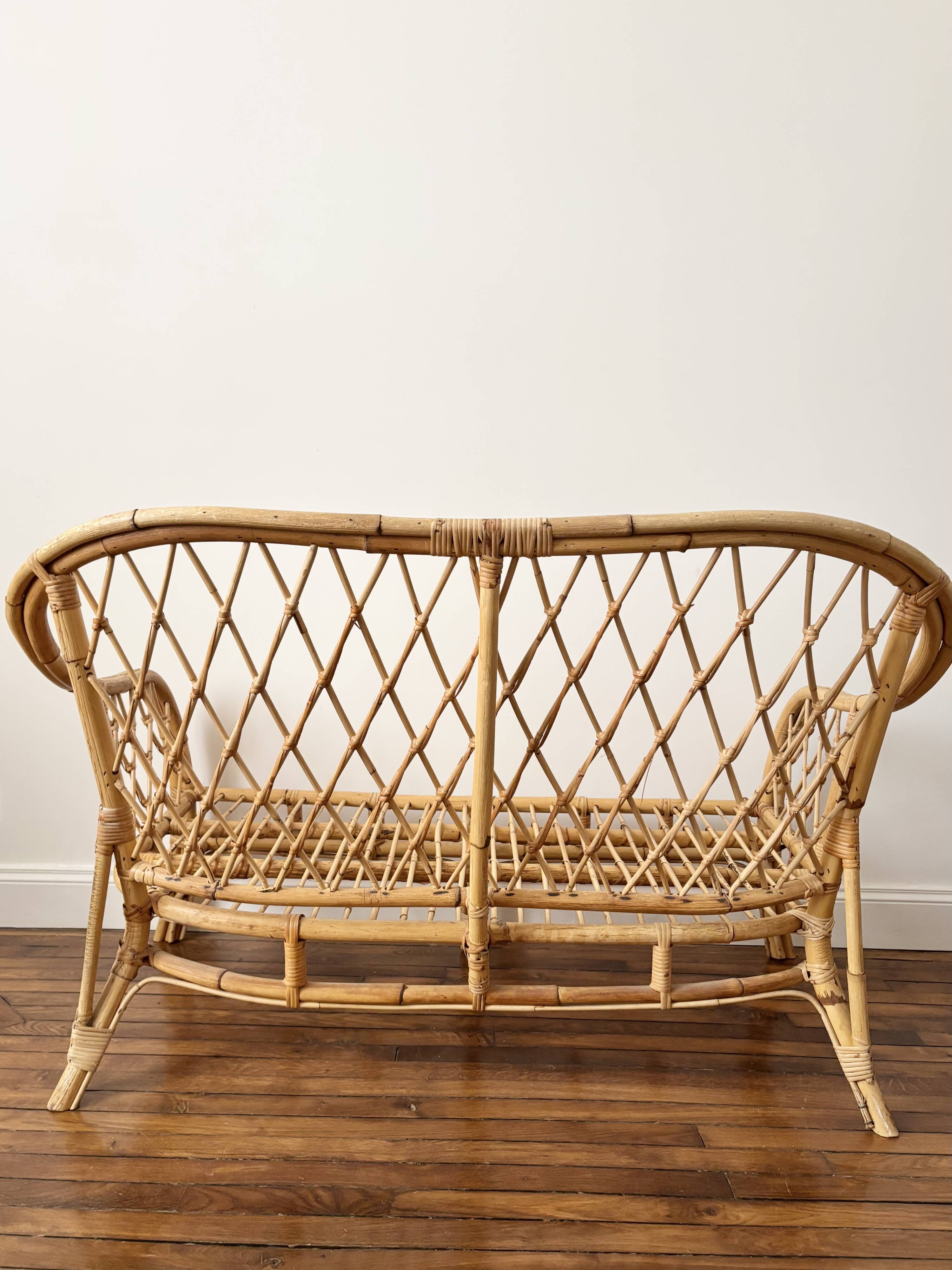 Vintage rattan two-seater sofa