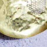 Hammered brass and perforated metal sconce