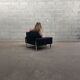 Pair of black leather armchairs