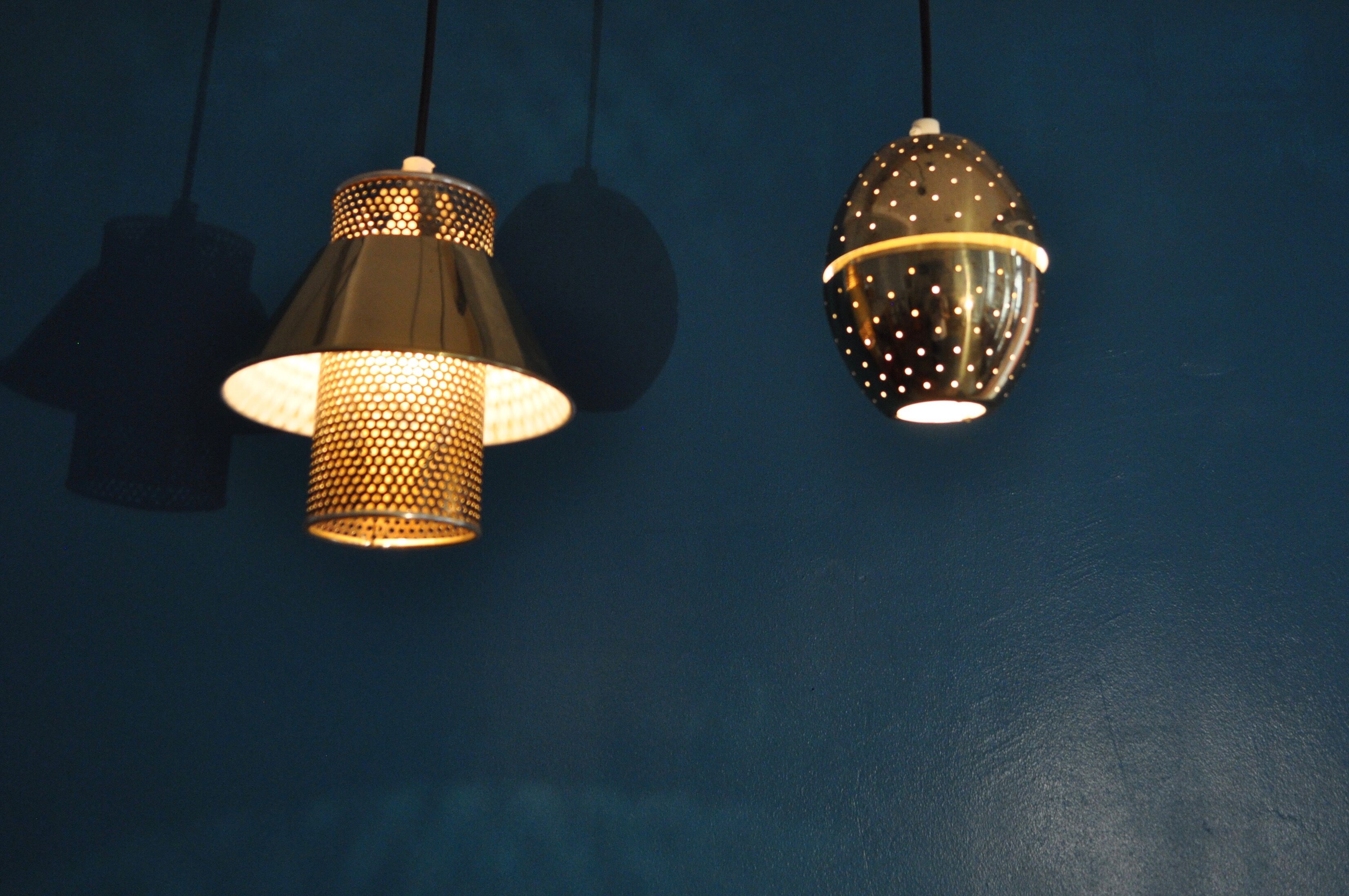 Pair of hanging lamps brass perforated Hans - Agne Jakobsson, 1960