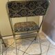 Two antique Manufrance folding chairs in metal and fabric