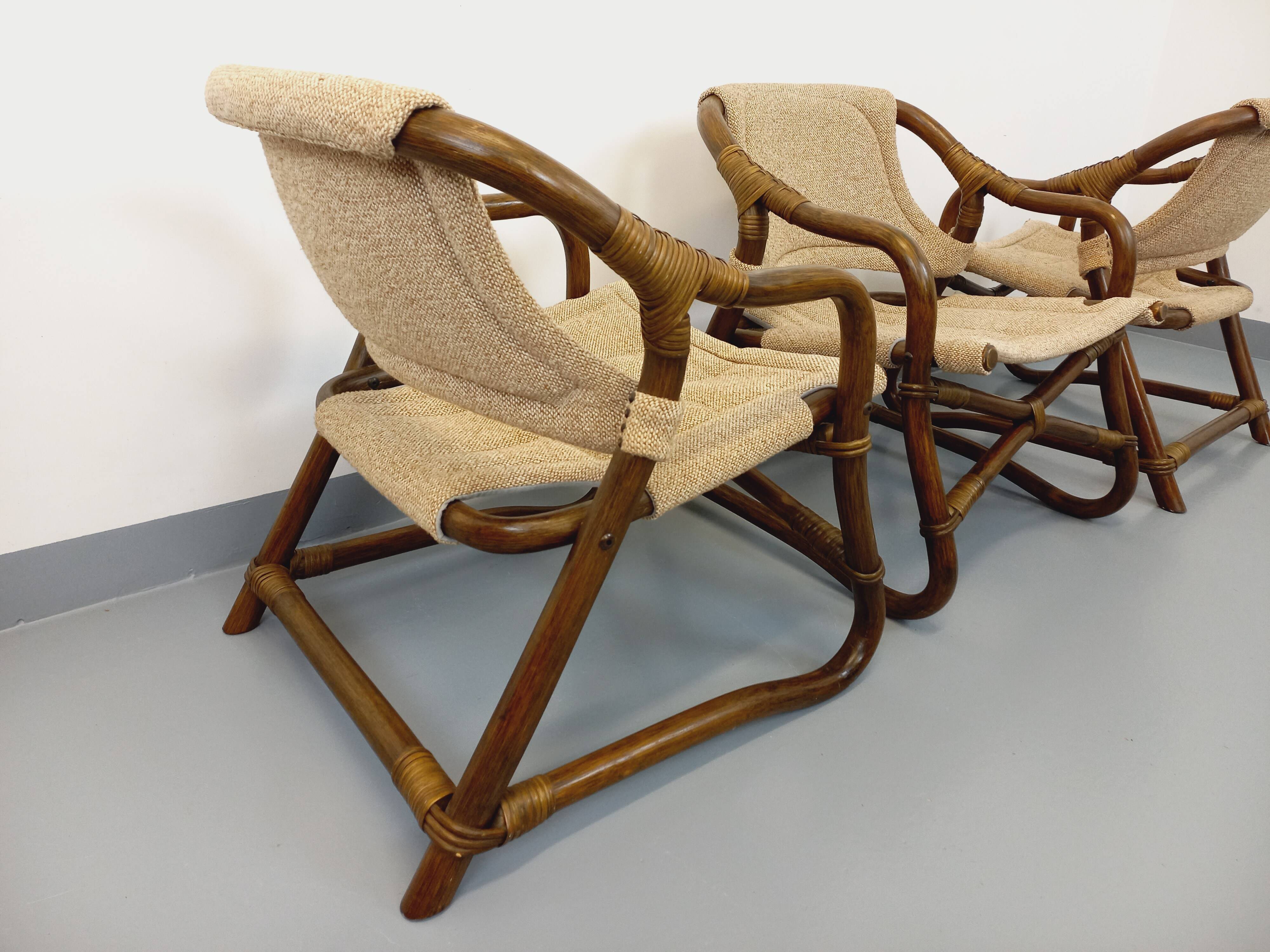 Set of 3 vintage Danish safari-style armchairs from Horsnæs Møbelfabrik in rattan and fabric from the 1980s.