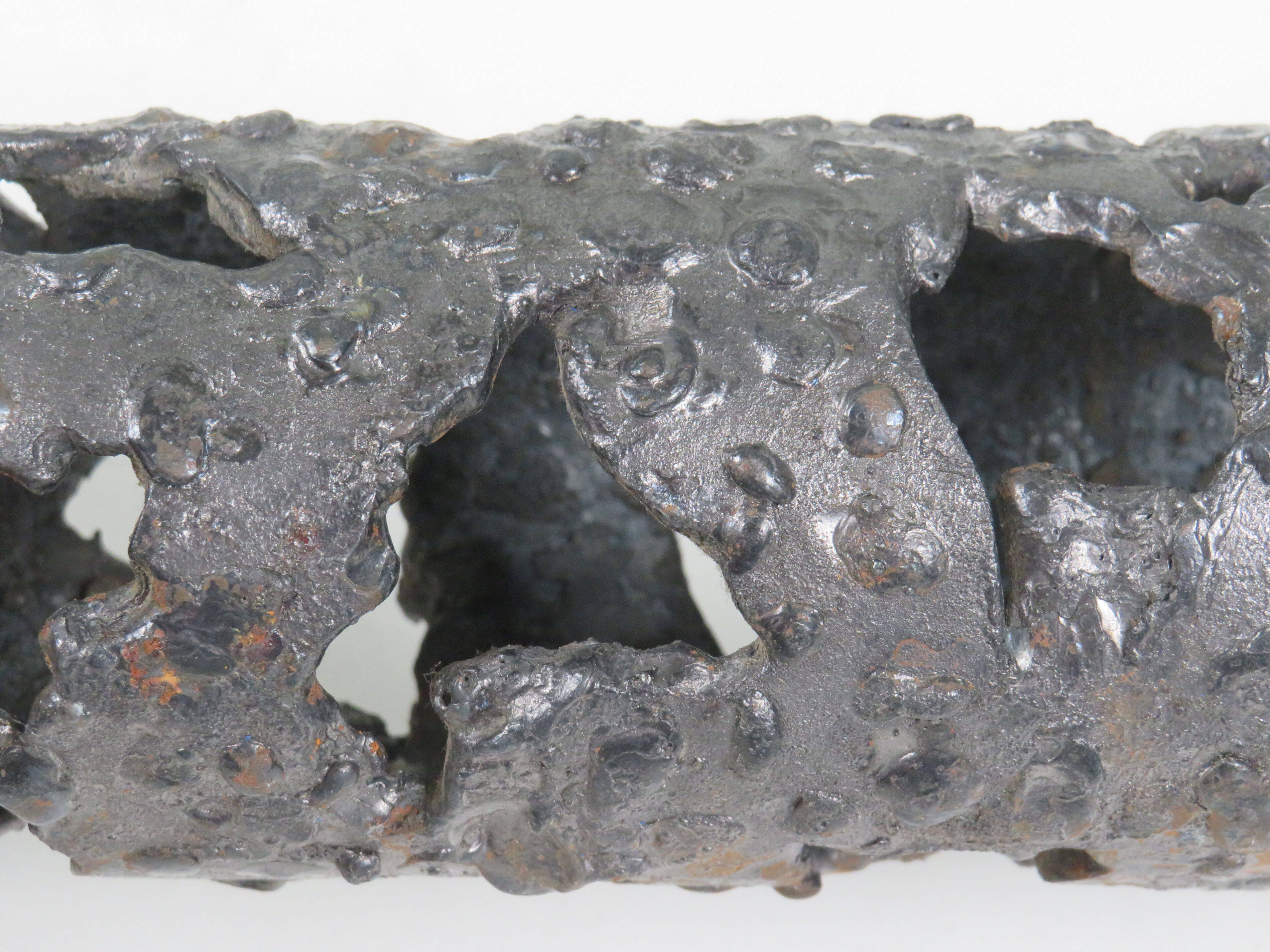 Brutalist wrought iron candlestick, European craftsmanship, 1960s