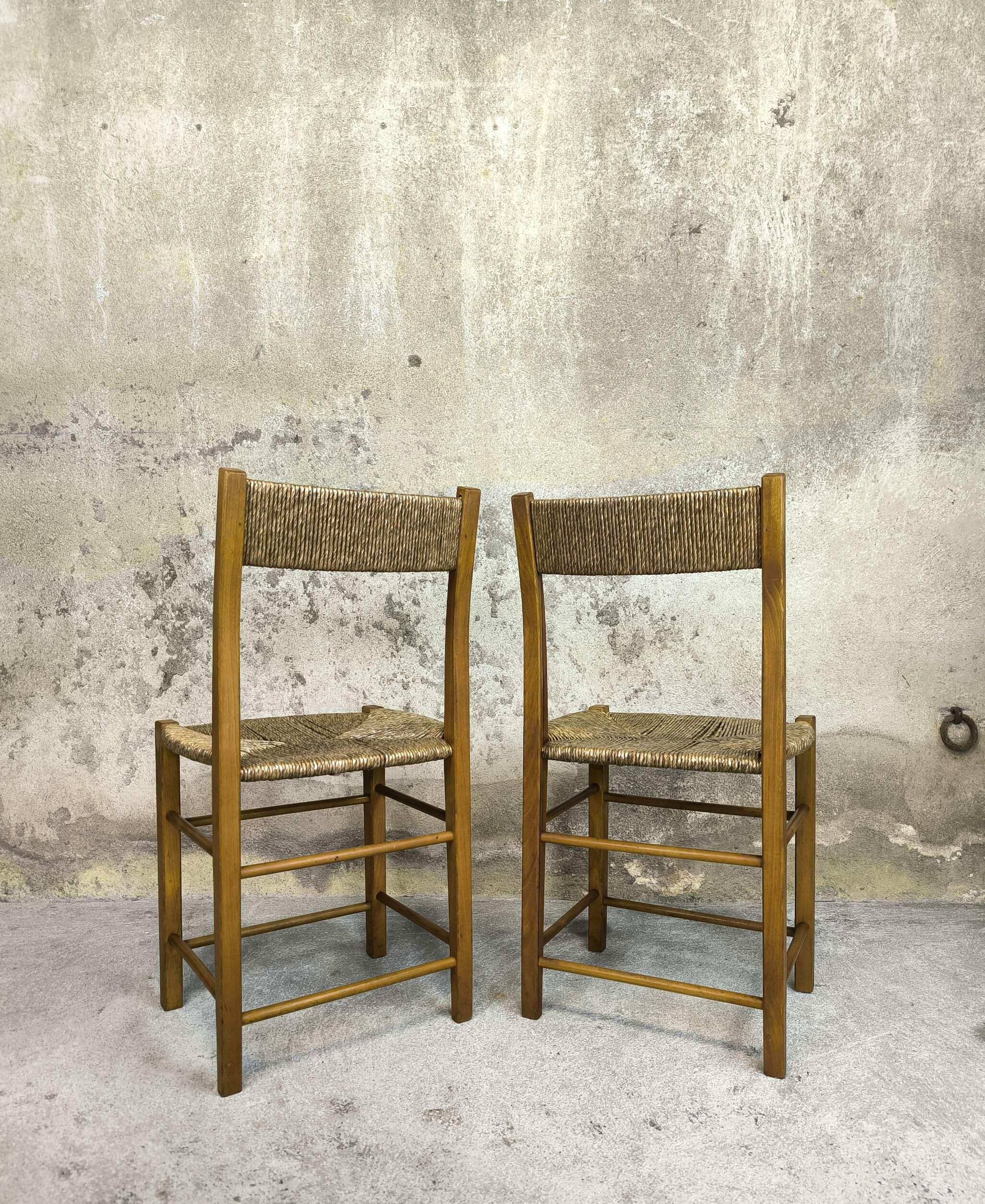 Pair of vintage wood and straw chairs