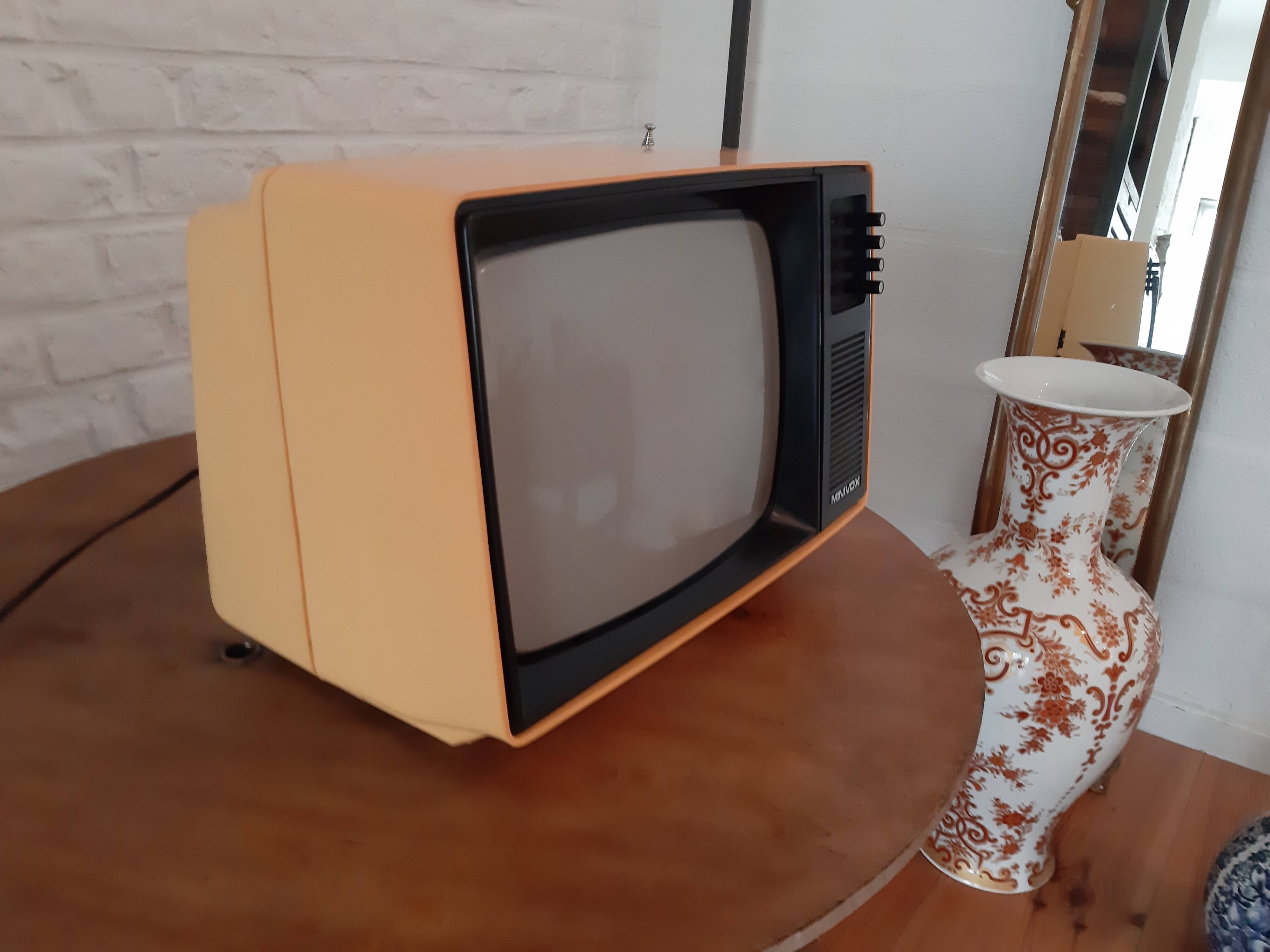 Yellow minivox vintage tv