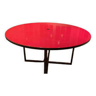 Round table in red enameled lava