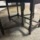 Folding wooden table with twisted legs