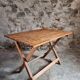 Vintage folding garden table in pine, mid-20th century.