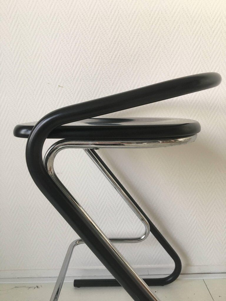 Set of three bar stools black and chrome of Thema Italy to the 1970s