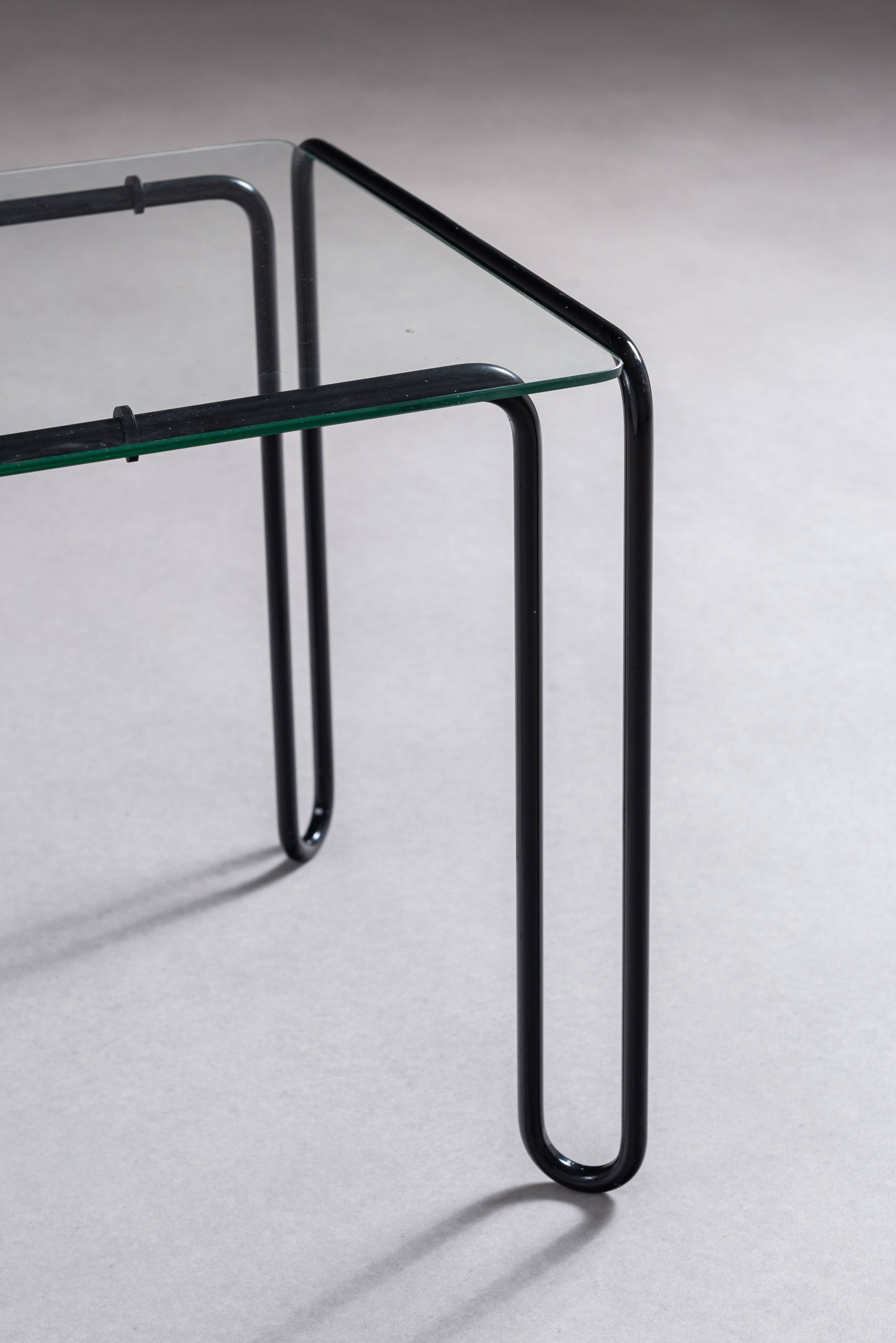 Minimalistic wireframe sidetable with glass top