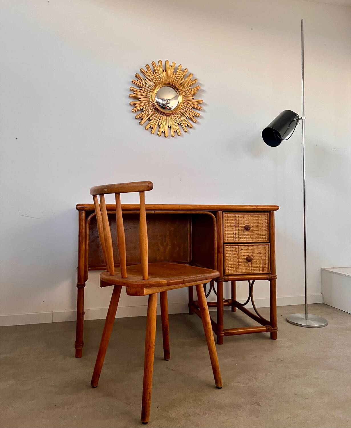 Old large golden sun mirror with rounded witch's eye in vintage resin from the 70s