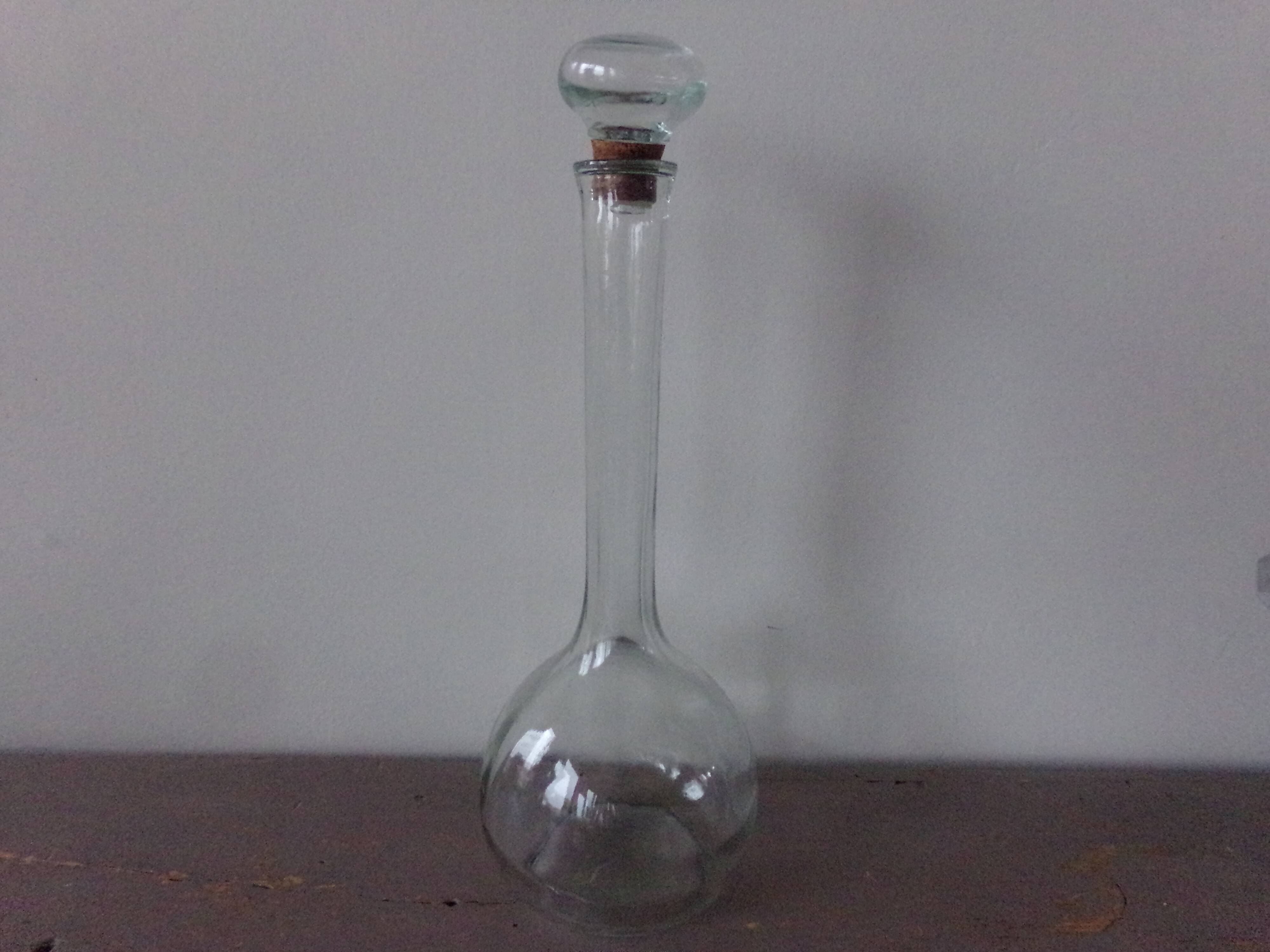 Glass bottle with its cap