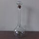 Glass bottle with its cap