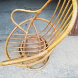 Fauteuil pivotant vintage en rotin
